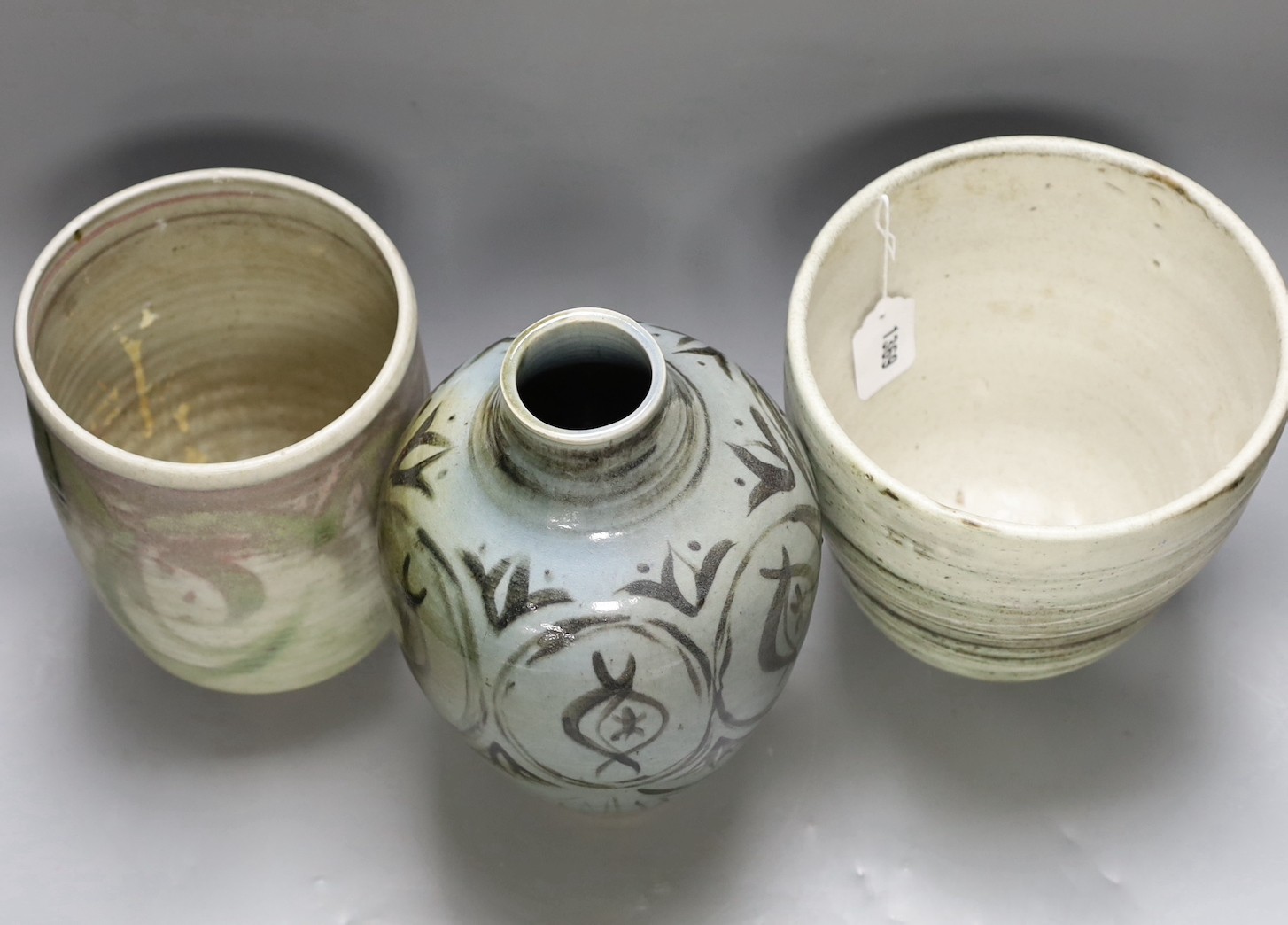 Two studio pottery vases and a lamp base, tallest 28cm